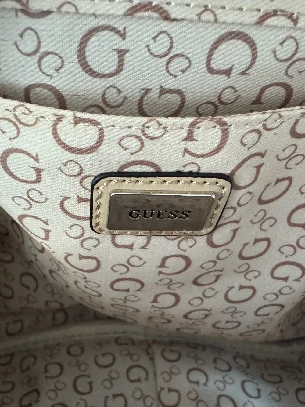 GUESS Gray Monogram Mini Backpack with Black Trim and Gold Logo